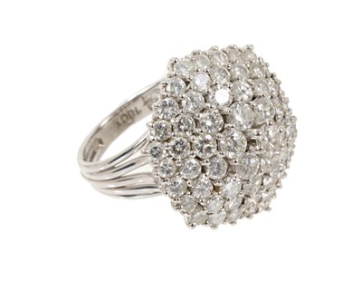 Lot 578 - Diamond cluster ring with a hexagonal tiered cluster of brilliant cut diamonds estimated to weigh to weigh approximately 3.8cts in total, in 18ct white gold setting, ring size M.