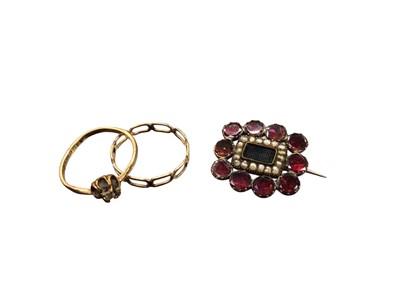 Lot 1005 - Georgian flat cut garnet and seed pearl brooch and two 9ct gold rings (3)