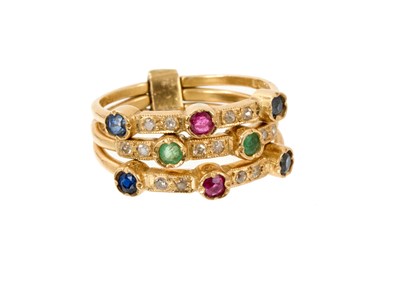 Lot 585 - Diamond and multi-gem three band ring with three bands of diamonds, rubies, sapphires and emeralds, ring size J½-K.