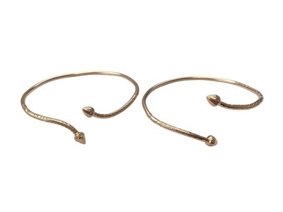 Lot 22 - Pair of Jamaican gold torque bangles, stamped 14k