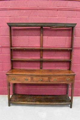 Lot 1390 - Mid-18th century oak high dresser, the shelved top with original cup hooks, the base having three drawers and shelf below on square supports