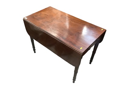 Lot 1301 - Regency mahogany pembroke table, with rounded rectangular drop leaf top and end frieze drawer on ring turned legs, 91 x 50cm