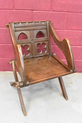 Lot 1309 - Gothic revival oak Glastonbury chair