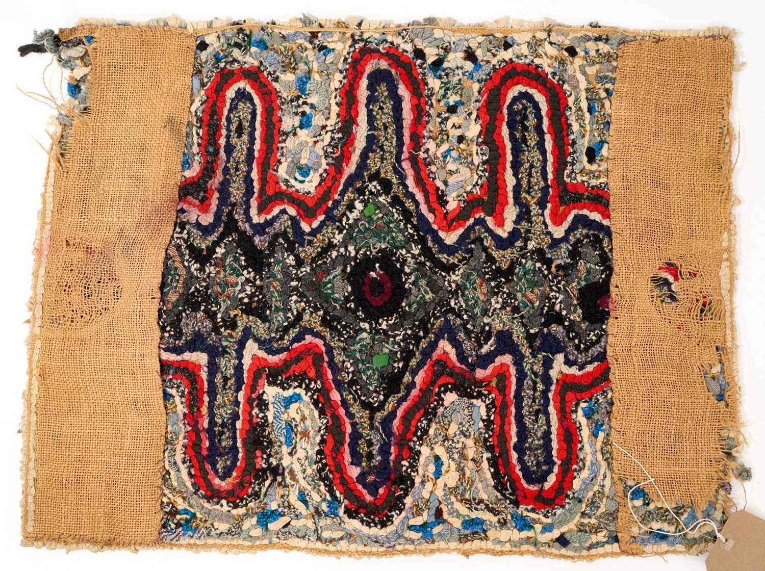 A Small Rag Lot 1007 - Small handmade rag rug by Lucie Aldridge