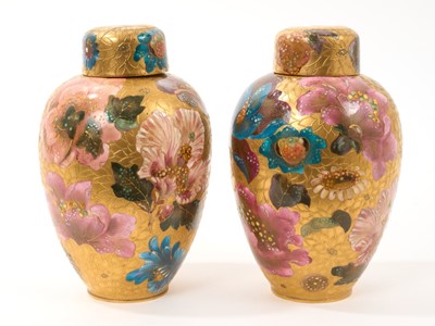 Lot 187 - Fine pair of Royal Crown Derby vases and covers, decorated with a range of flowers, with jewelled enamel decoration, on a gilt-tooled ground, with with date cipher for 1888