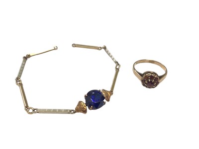 Lot 61 - 9ct gold garnet cluster ring and a yellow and white metal bar link chain set with a synthetic blue gem stone (2)