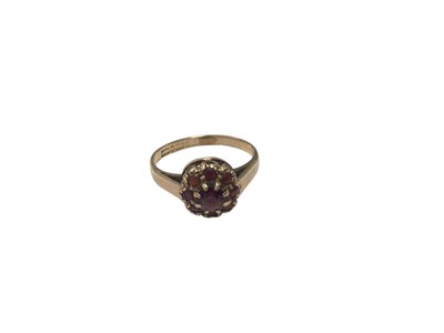 Lot 61 - 9ct gold garnet cluster ring and a yellow and white metal bar link chain set with a synthetic blue gem stone (2)