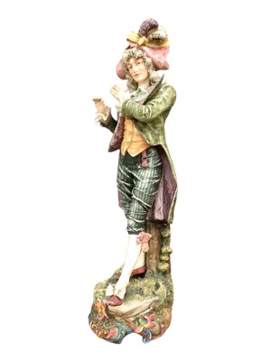 Lot 192 - Large late 19th century continental porcelain figure of a musician