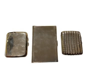 Lot 404 - Early 20th century silver cigarette case of rectangular form, and two others