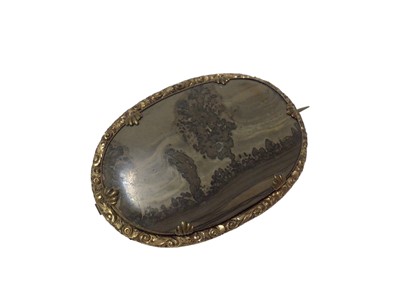Lot 476 - 19th century landscape agate brooch