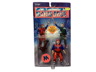 Lot 347 - ERTL (c1993) Super Mario Bros. (Official Nintendo Licensed Product) Mario 4" action figure, on card with bubblepack No.7780 (1)