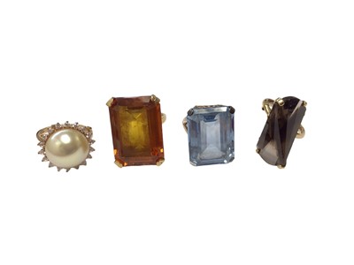 Lot 112 - Four 9ct gold gem set cocktail rings