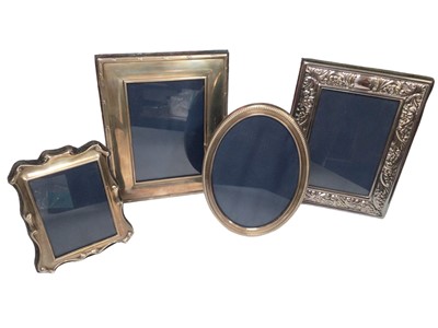 Lot 218 - Three silver photograph frames, various sizes and one silver plated (4)