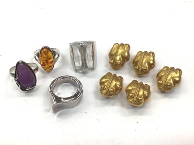 Lot 1014 - Two silver gem set rings, one other silver ring, Swarovski crystal ring and five gilt frog buttons