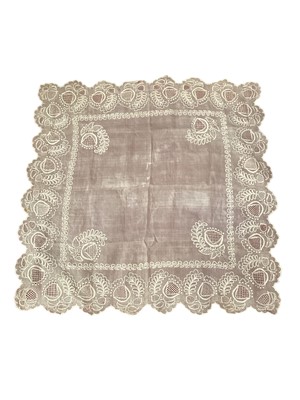 Lot 2055 - 19th century muslin large cloth finely embroidered with cut-out work and needle fillings in fancy stitches and satin stitches, stylized scrolling flowers and leaves.  Scalloped edges with tiny pico...