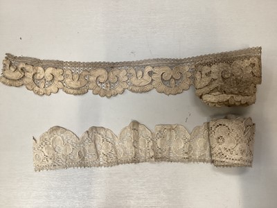 Lot 2056 - Good selection of 19th and 20th century handmade and machine-made lace.  Mainly rolls of trims and borders , various widths.  Linen lace, bobbin lace, filet lace, Brussela lace etc.  Plus some lace...