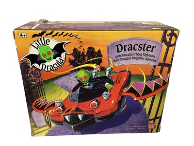 Lot 383 - Bandai (c1991) Little Dracula vehicles Coffin Car No.4052, Easy Biter Bi-Cycle No.4053 & Dracaster No.4050, plus Dreamworks Garlicmobile No.4051, all boxed (4)