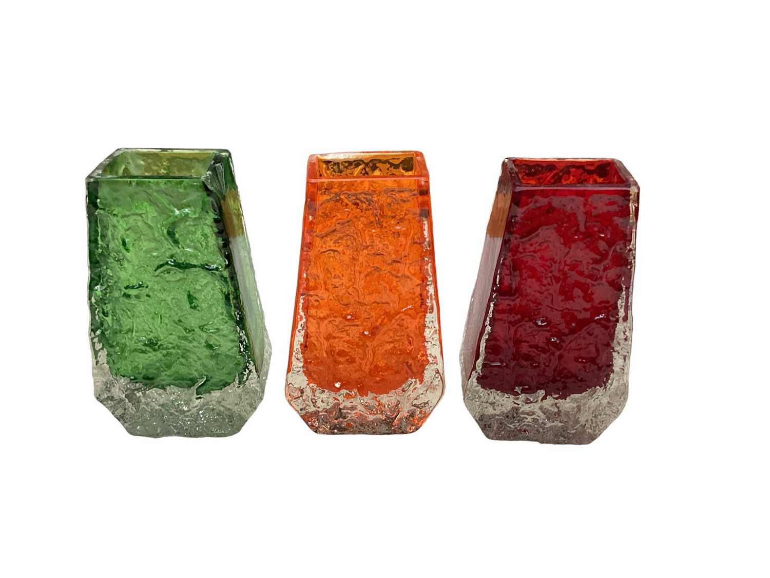 Lot 1118 - Three Whitefriars Coffin vases in Meadow green, Tangerine and Ruby, designed by Geoffrey Baxter, 13.5cm high