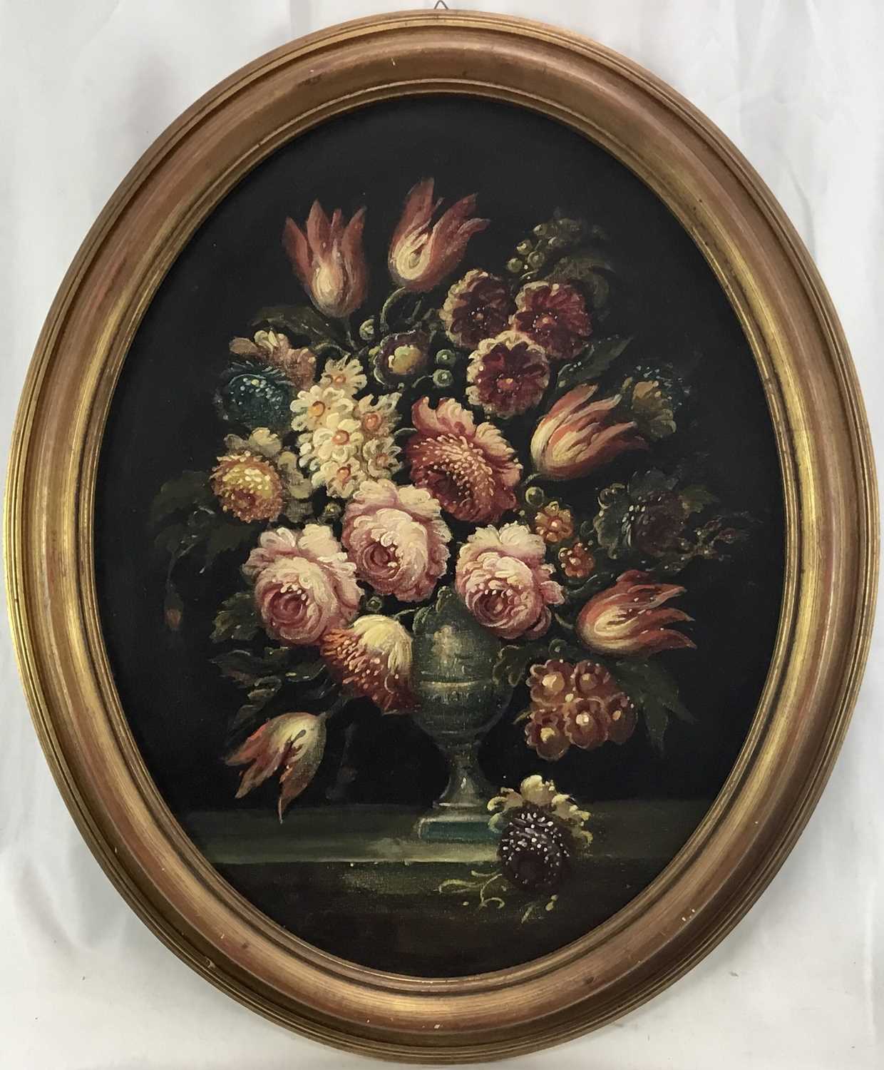 Lot 84 - French School mid 20th century, oval oil on canvas - A still life of summer flowers in a vase, in gilt frame. 48 x 38cm.