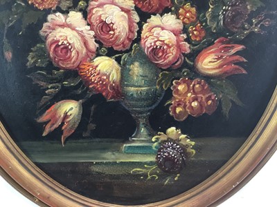 Lot 84 - French School mid 20th century, oval oil on canvas - A still life of summer flowers in a vase, in gilt frame. 48 x 38cm.