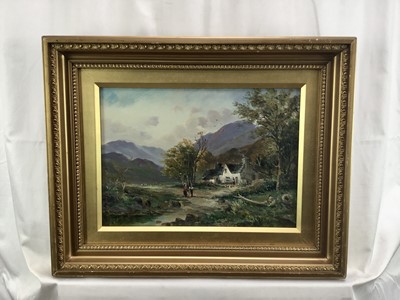 Lot 57 - English School late 19th century, oil on canvas - Figures by a stream near a farmhouse, mountains beyond, in gilt frame. 24 x 34cm.