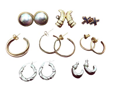 Lot 4 - Group of 9ct gold earrings including mother of pearl, pair of sapphire cross earrings, pair of white gold hoops, other hoops and one pair of plated earrings (7 pairs and one single)