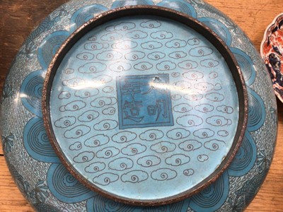 Lot 17 - Large Chinese cloisonné bowl decorated with a dragon in tones of blue, four-character mark to base