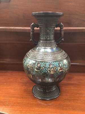 Lot 129 - An unusual Chinese enamelled bronze vase decorated with a frieze of Egyptian figures