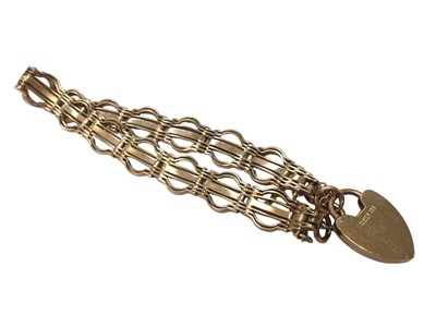 Lot 67 - Yellow metal fancy link bracelet with 9ct gold padlock clasp