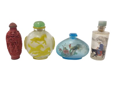 Lot 859 - Peking style overlay glass snuff bottle, 8cm high, three others
