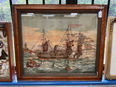 Lot 296 - 19th century woolwork picture of an American steamship, in glazed maple veneered frame