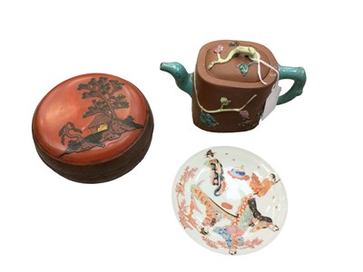 Lot 23 - Chinese terracotta teapot, Japanese lacquer box and cover and a Japanese porcelain saucer (3)