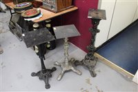 Lot 3494 - Three cast iron table bases for machine mounts