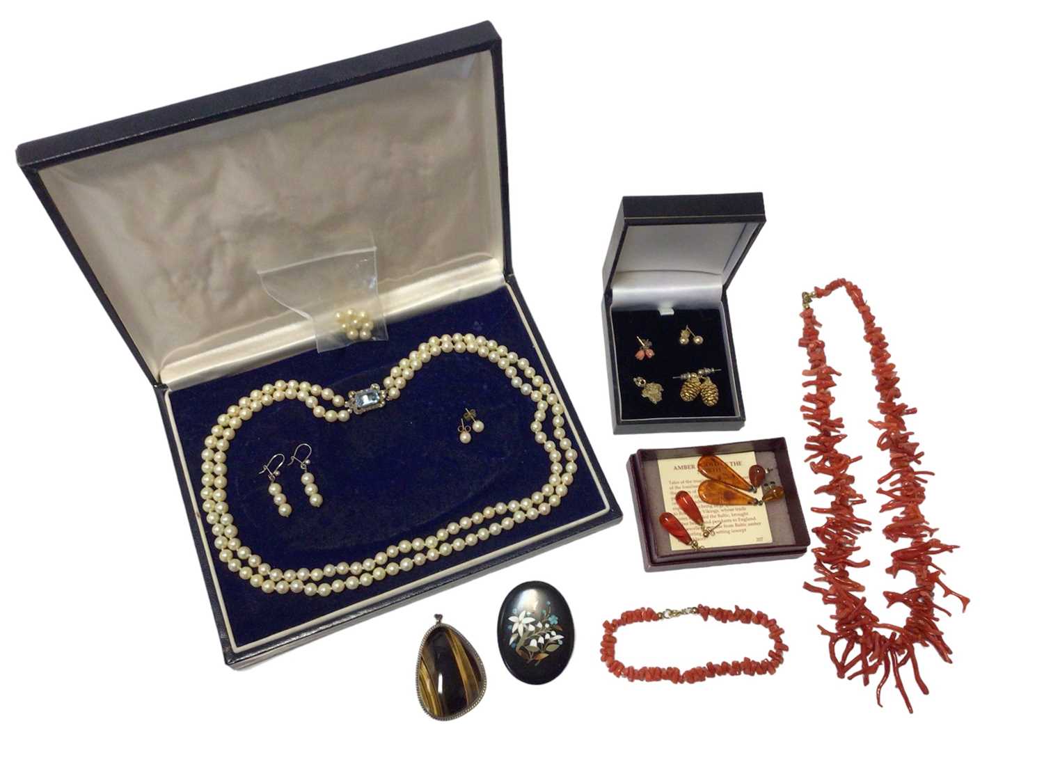 Lot 602 - Group of jewellery to include a coral necklace, a cultured pearl two-strand necklace and earrings, pietra dura brooch, amber earrings, carnelian earrings etc