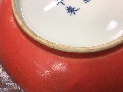 Lot 25 - A pair of Chinese porcelain dishes with unusual red crackled glaze, six character marks in underglaze blue