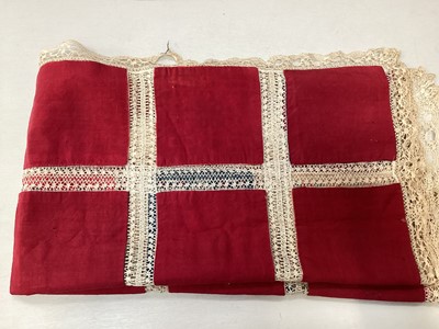 Lot 2069 - A selection of vintage textiles including an East European patchwork cover with geometric cross stitch panels connected with bobbin lace, small velvet patchwork panel, Iranian printed cotton cover...