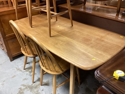 Lot 1217 - Set of four Ercol stick back chairs and an Ercol dining table