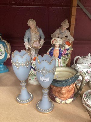 Lot 631 - Pair of Meissen-style porcelain figures, pair of late Victorian jewelled glass vases, tow Victorian Staffordshire pottery figures and a Doulton toby jug