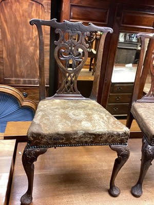 Lot 1369 - Two George III style carved walnut side chairs