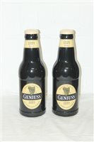 Lot 3454 - Two large Guinness bottles