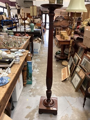 Lot 1243 - Mahogany torchere with carved decoration