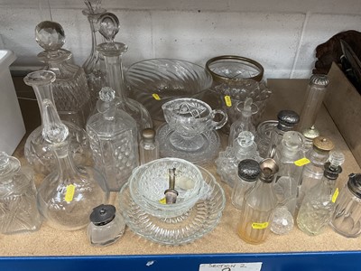 Lot 240 - Collection of cut and pressed glass including Regency silver mounted cruets and jars, decanters, etc.