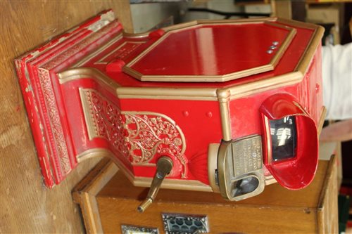 Lot 3458 - Red cast iron mutoscope and stand - 1d...