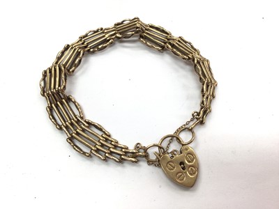 Lot 1026 - 9ct gold gate bracelet with padlock clasp