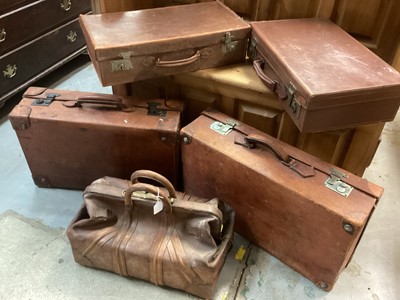 Lot 604 - Old leather Gladstone bag, and four vintage leather suitcases