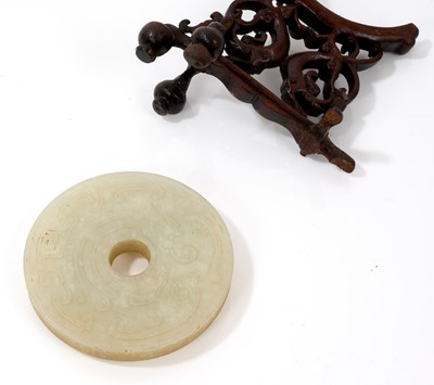 Lot 760 - Celadon jade chilong bi disc, probably 19th century