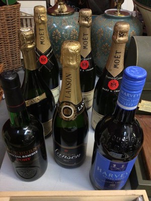 Lot 306 - Four bottles of champagne to include three Moët and one Lanson, one bottle of Cava, two bottles of wine in case, Cockburns port and Harvey's sherry (9)