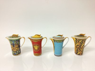 Lot 1259 - Group of four Versace porcelain jugs and covers, and two Portuguese inkwells