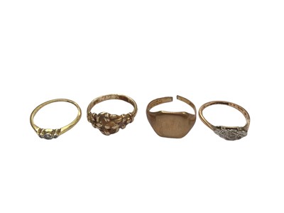 Lot 1031 - Four 18ct gold rings including two diamond set