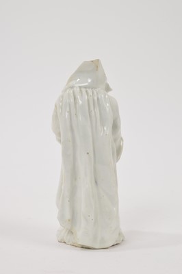 Lot 15 - 18th century white glazed porcelain figure of a man in a greatcoat, losses and restoration